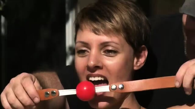 Short Haired Hottie Tied And Gagged Spread In The Sun