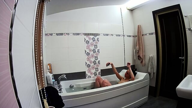 Stella Relaxing In The Bathtub