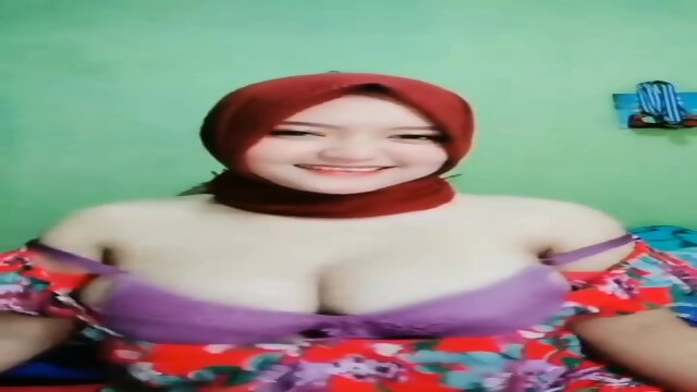 Red hijab muslim woman